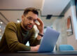 Businessman dealing with email notifications - learn to manage with Domain Systems.
